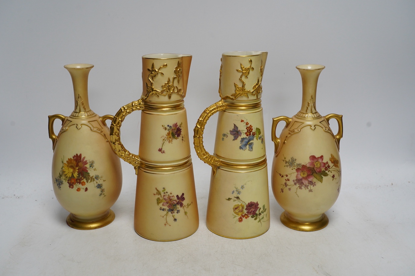 A pair of Royal Worcester blush ivory vases and a pair of ewers, tallest 22cm. Condition - good